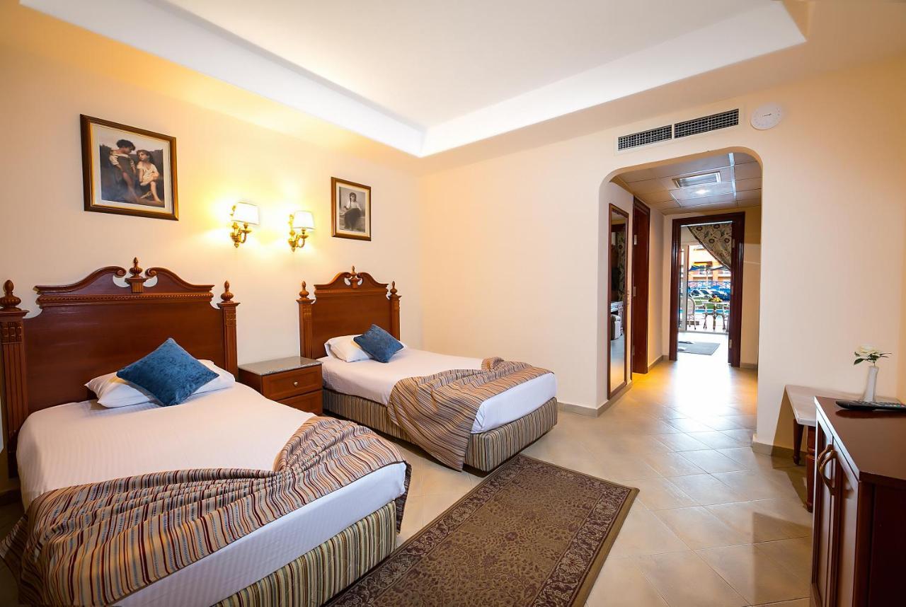 泰坦尼克号宫酒店 洪加達 外观 照片 A room at the hotel
